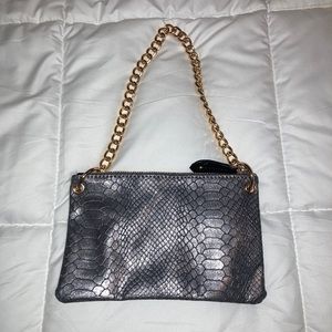 Big Buddha Metallic Wristlet